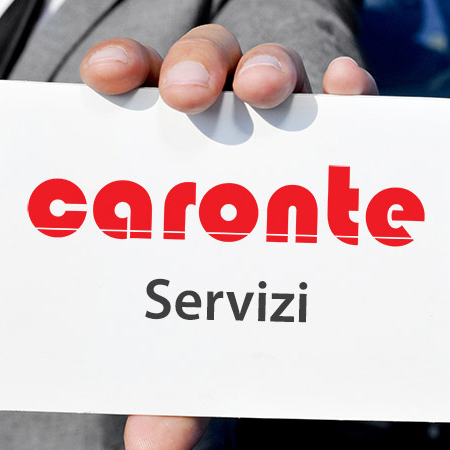 man in suit holding a blank signboard with a car in the backgrou